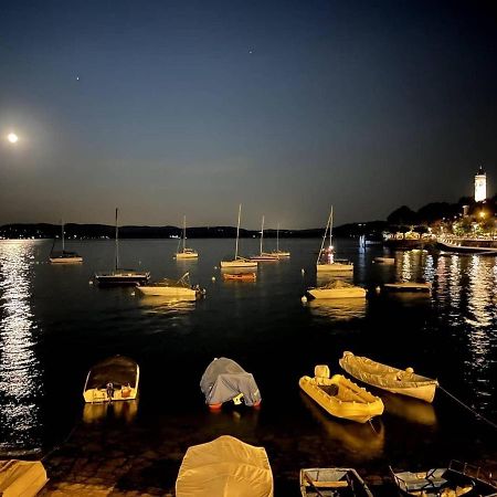 Appartamento Al Lago Lesa Bagian luar foto