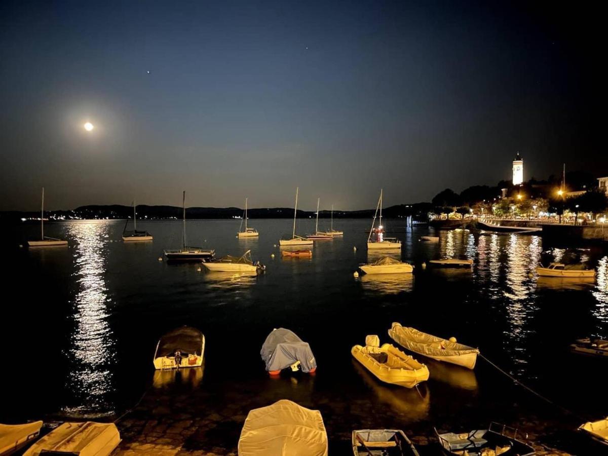 Appartamento Al Lago Lesa Bagian luar foto